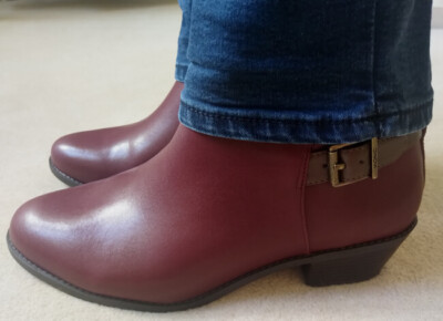 These cute Vionic booties felt fine on carpet but rubbed my feet out walking. Thank goodness for the 30 day money back guarantee!