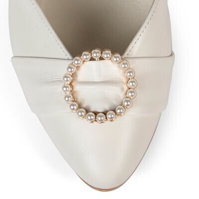 Close up of shoe with almond toe, in between a rounded and pointed toe shape