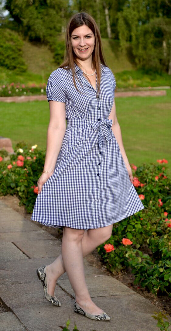 Beth in a made-to-measure gingham dress with Pretty Ballerinas pointed toe flats