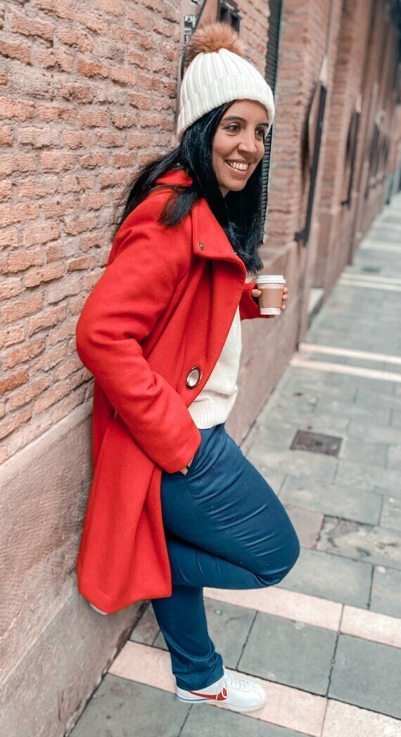 Laura loves her Nike sneakers. Coat: Long Tall Sally