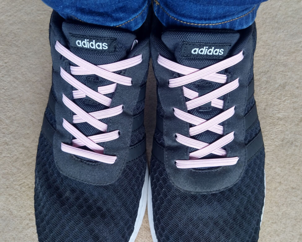 Pink xpand no-tie laces in adidas black lite racer runners